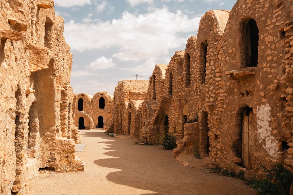 Explore the historic ksour architecture of Tunisia, showcasing ancient desert landscapes and stone structures.